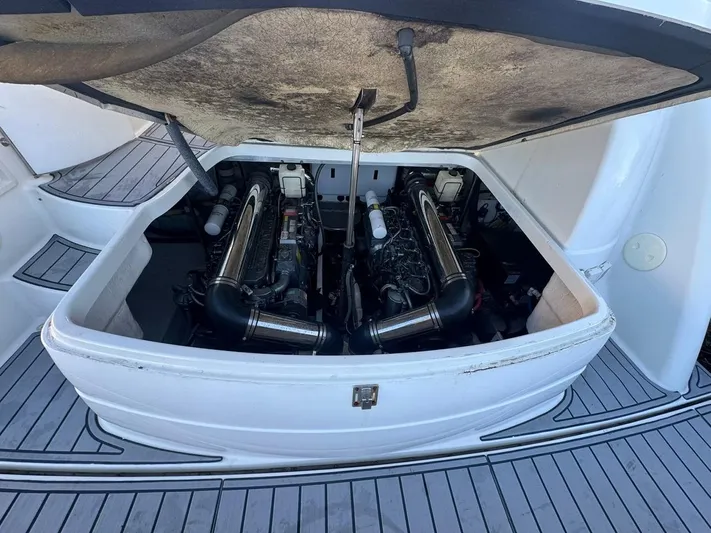 Cash Is King Yacht Photos Pics Engine compartment of a 2002 Formula 40 PC boat, showcasing dual engines.