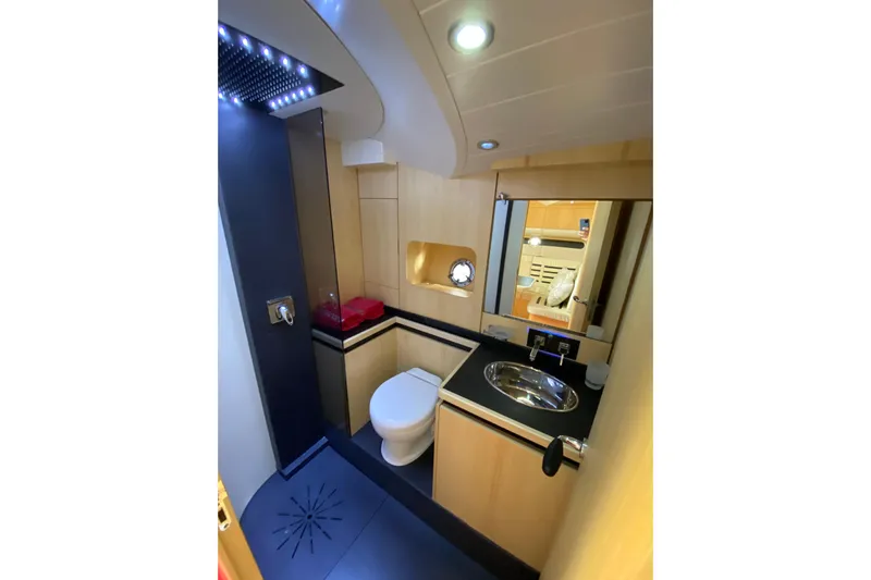  Yacht Photos Pics Luxurious yacht bathroom with modern fixtures, sleek design, and ambient lighting, Teorema 42 ROSSOCORSA 2008.