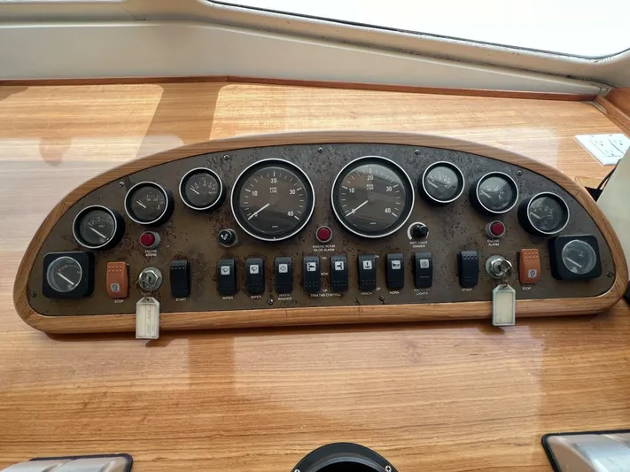 Yacht Z Yacht Photos Pics Control panel of a 1998 Riviera 48 Convertible yacht with gauges and switches.