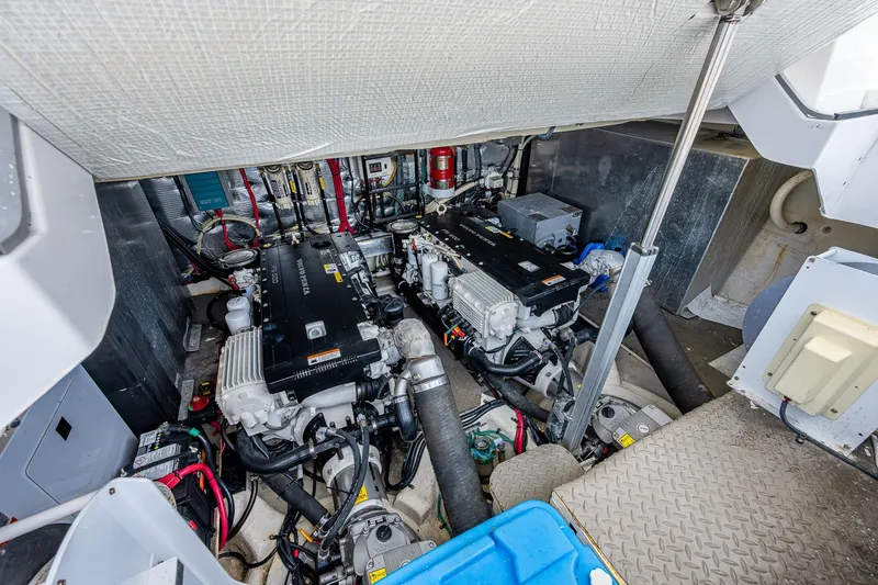 R&r III Yacht Photos Pics 2015 Regal 46 Sport Coupe engine room with twin engines and mechanical components.