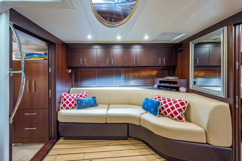 R&r III Yacht Photos Pics Luxurious interior of 2015 Regal 46 Sport Coupe with leather seating and modern decor.