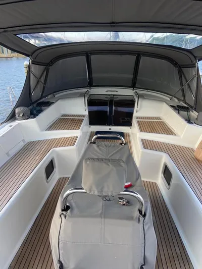 Padraigin II Yacht Photos Pics 2016 Jeanneau 58 yacht cockpit with teak flooring and covered seating area.