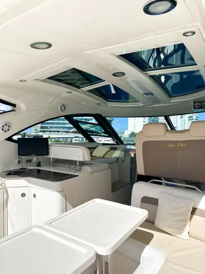 2013 Sea Ray 470 Sundancer @ Cancun Yacht Photos Pics Luxurious interior of 2013 Sea Ray 470 Sundancer yacht with modern amenities and seating.