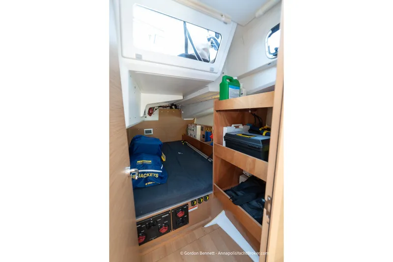 No Regrets Yacht Photos Pics Interior cabin of 2019 Jeanneau Sun Odyssey 440 with storage and life jackets.
