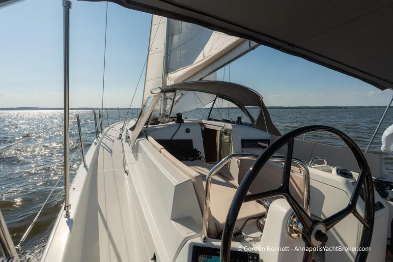 No Regrets Yacht Photos Pics 2019 Jeanneau Sun Odyssey 440 sailing on a sunny day, showcasing sleek design and open water.