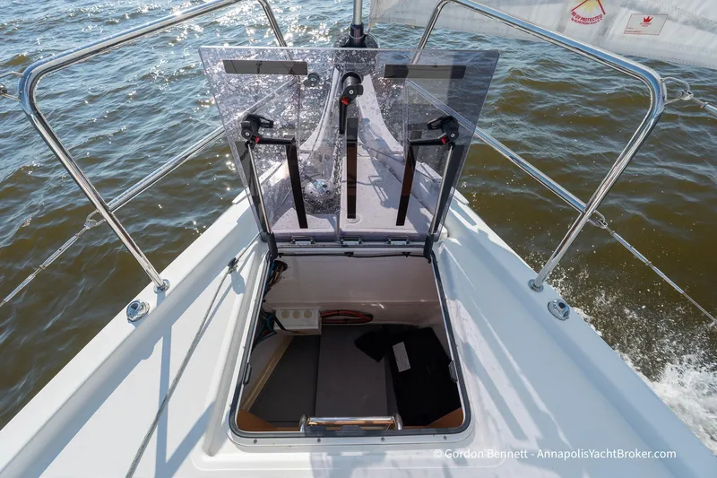 No Regrets Yacht Photos Pics 2019 Jeanneau Sun Odyssey 440 sailboat with open hatch, sailing on water.