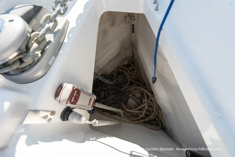 No Regrets Yacht Photos Pics Anchor locker of 2019 Jeanneau Sun Odyssey 440 with ropes and chain.