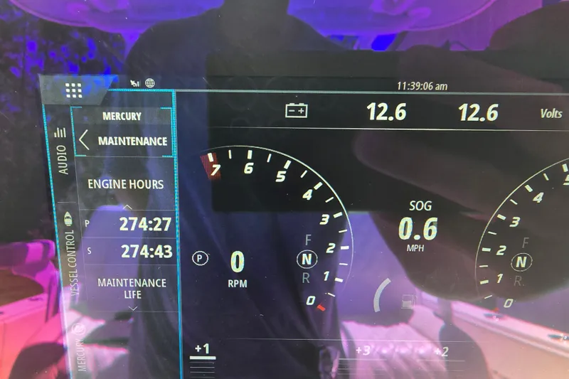 Humble Beginnings Yacht Photos Pics Dashboard of 2022 Invincible 33 Catamaran showing engine hours and speed.