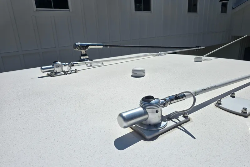 Humble Beginnings Yacht Photos Pics Rooftop view of 2022 Invincible 33 Catamaran with mounted antennas and equipment.