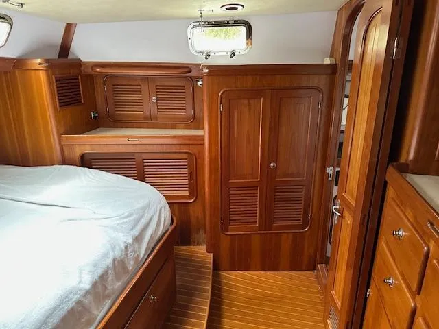 Last Love Yacht Photos Pics Luxurious wooden interior of 2014 Passport 545 Vista yacht cabin.