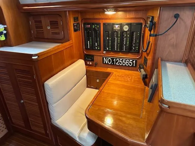 Last Love Yacht Photos Pics 2014 Passport 545 Vista yacht interior with navigation station and control panel.