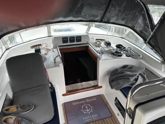 Last Love Yacht Photos Pics Interior of 2014 Passport 545 Vista yacht with seating and nautical decor.
