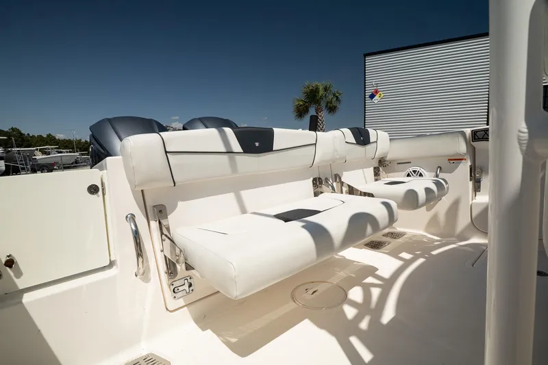  Yacht Photos Pics 2018 Wellcraft 302 Fisherman boat interior with white seating and modern design.