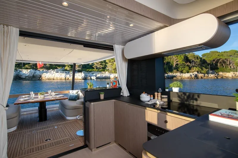  Yacht Photos Pics Interior of Azimut Magellano 60 yacht, 2025 model, overlooking the water.