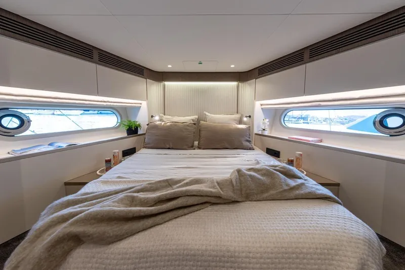  Yacht Photos Pics Luxurious bedroom on the Azimut Magellano 60 yacht, year 2025.
