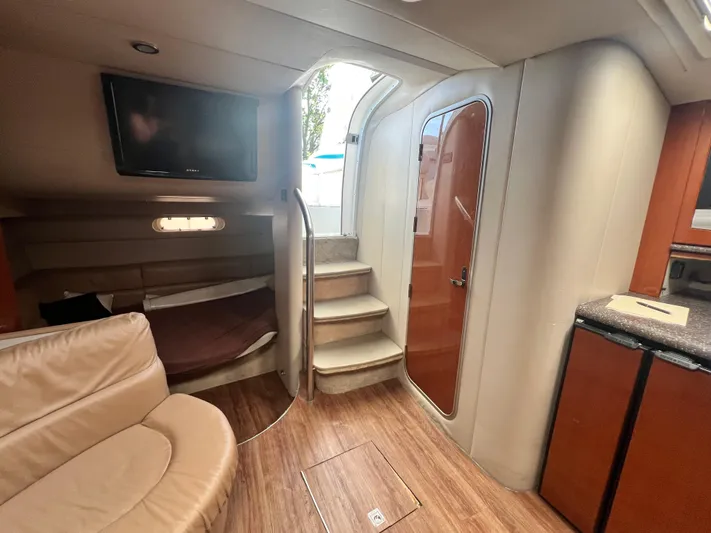 Gracie B Yacht Photos Pics Interior of 2006 Formula 40 PC yacht with modern furnishings and wooden flooring.