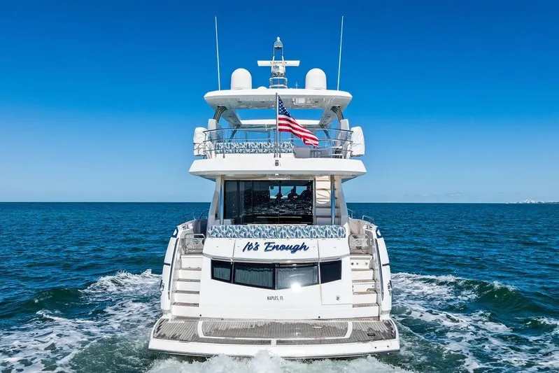 It's Enough Yacht Photos Pics Sunseeker Manhattan 73 yacht cruising on open sea, rear view, 2013 model.