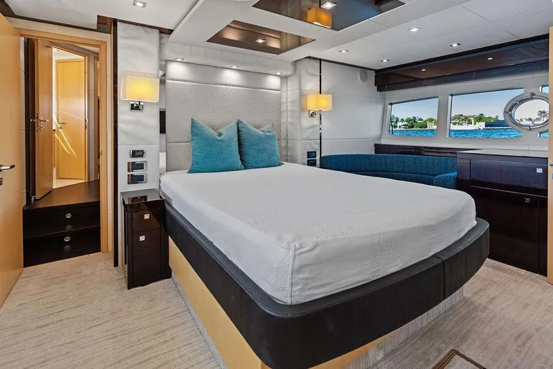It's Enough Yacht Photos Pics Luxurious bedroom interior of 2013 Sunseeker Manhattan 73 yacht with ocean view.