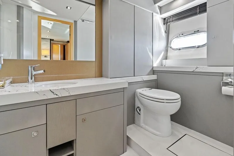 It's Enough Yacht Photos Pics Luxurious bathroom in 2013 Sunseeker Manhattan 73 yacht with modern fixtures and elegant design.