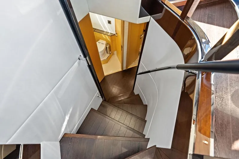It's Enough Yacht Photos Pics Staircase leading to bathroom on 2013 Sunseeker Manhattan 73 yacht interior.