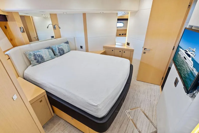 It's Enough Yacht Photos Pics Luxurious bedroom interior of 2013 Sunseeker Manhattan 73 yacht with modern decor.
