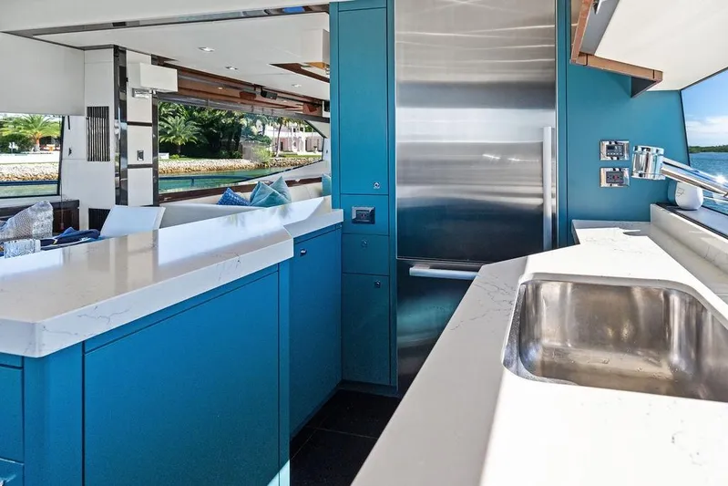 It's Enough Yacht Photos Pics Luxurious interior of 2013 Sunseeker Manhattan 73 yacht with modern kitchen design.