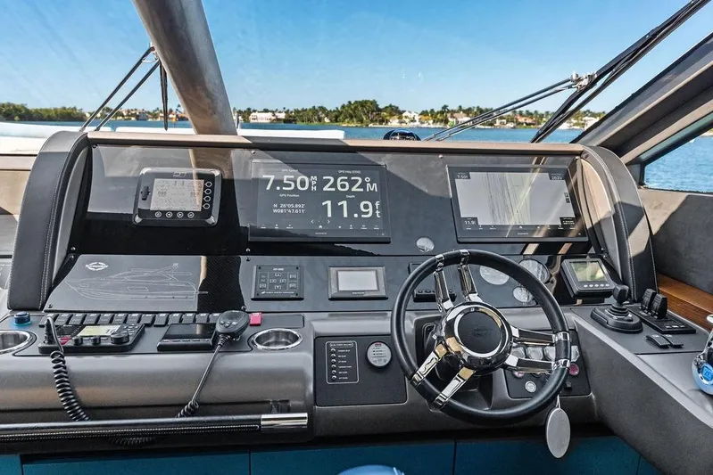 It's Enough Yacht Photos Pics Cockpit of 2013 Sunseeker Manhattan 73 yacht with advanced navigation controls and displays.