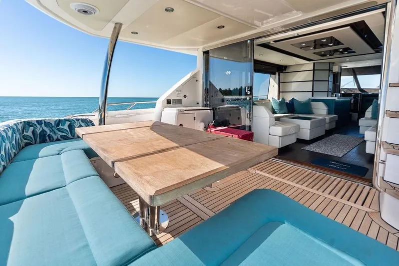 It's Enough Yacht Photos Pics Luxurious 2013 Sunseeker Manhattan 73 yacht interior with ocean view and elegant seating area.