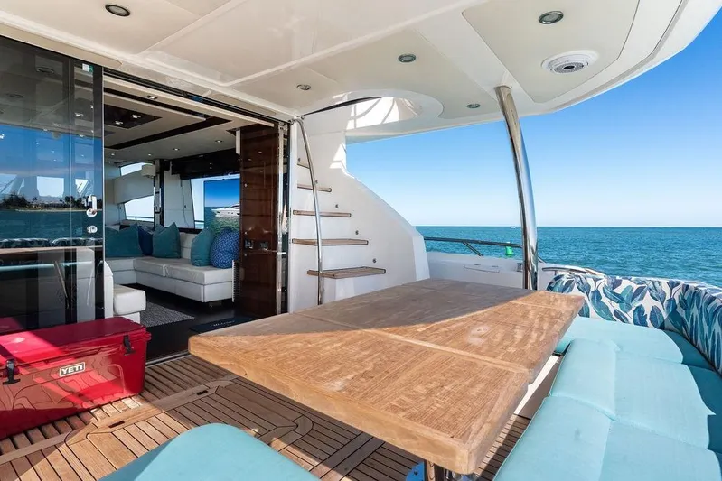 It's Enough Yacht Photos Pics Luxurious 2013 Sunseeker Manhattan 73 yacht interior with ocean view and elegant seating area.