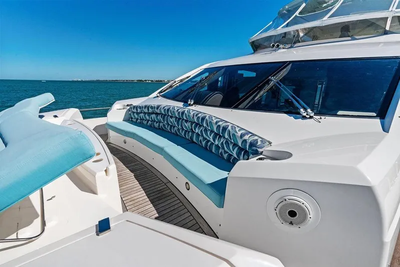 It's Enough Yacht Photos Pics Luxurious 2013 Sunseeker Manhattan 73 yacht deck with ocean view and comfortable seating.