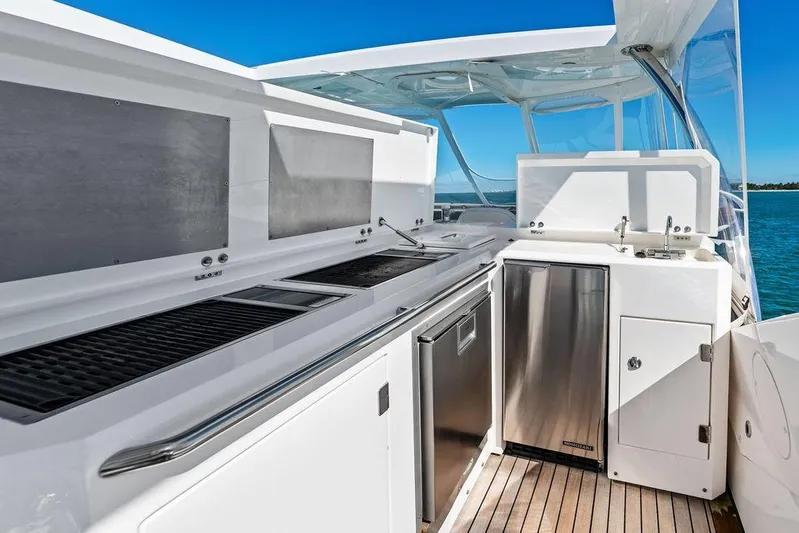 It's Enough Yacht Photos Pics Luxurious 2013 Sunseeker Manhattan 73 yacht kitchen with modern appliances and ocean view.