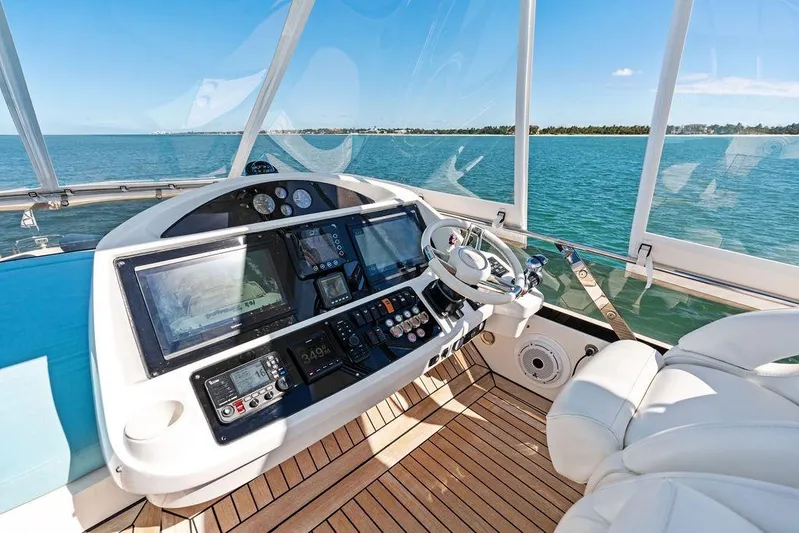 It's Enough Yacht Photos Pics Luxurious helm of 2013 Sunseeker Manhattan 73 yacht with advanced navigation systems.