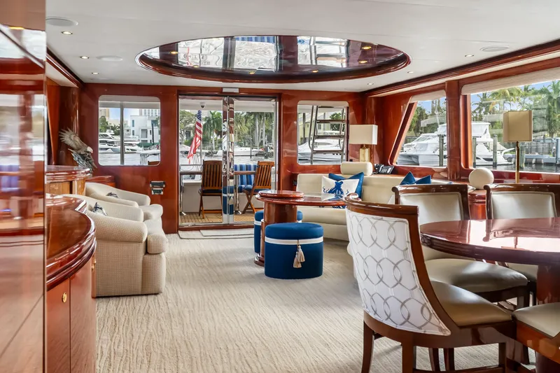  Yacht Photos Pics Luxurious interior of 2005 Ocean Alexander 80 Motoryacht with elegant seating and polished wood finishes.