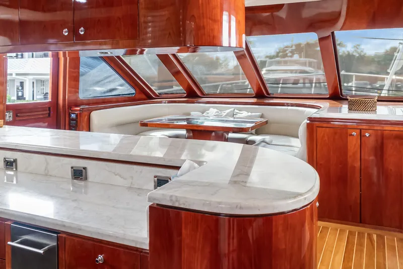  Yacht Photos Pics Luxurious interior of 2005 Ocean Alexander 80 Motoryacht with elegant wood and marble finishes.