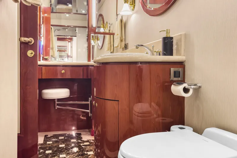  Yacht Photos Pics Luxurious bathroom in 2005 Ocean Alexander 80 Motoryacht with elegant wood cabinetry.