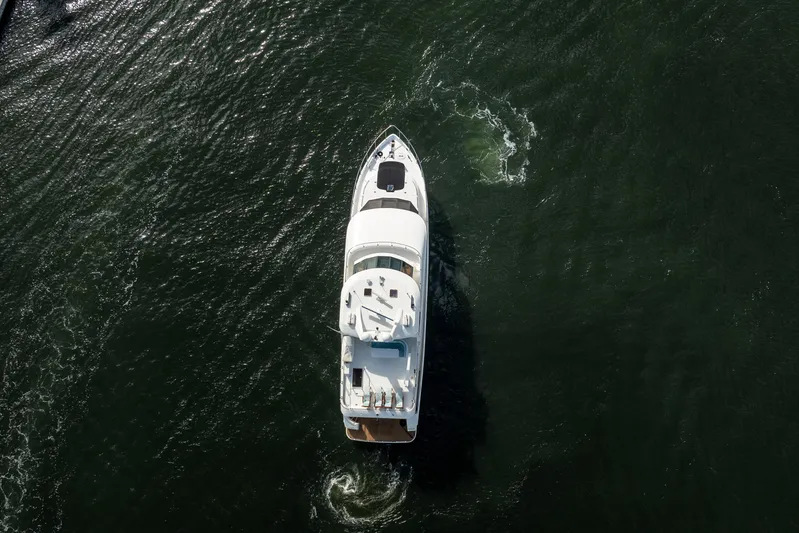  Yacht Photos Pics Aerial view of 2005 Ocean Alexander 80 Motoryacht cruising on open water.