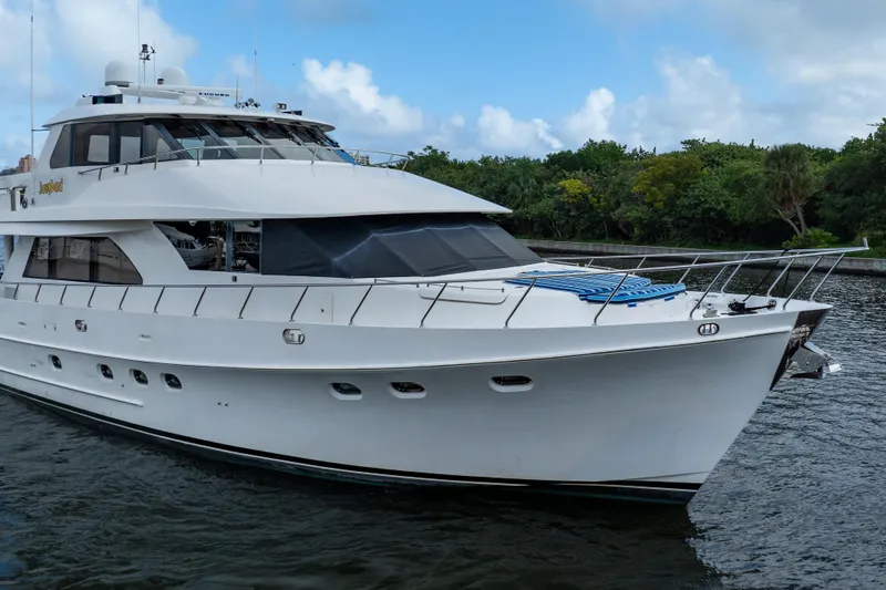  Yacht Photos Pics 2005 Ocean Alexander 80 Motoryacht cruising on a serene waterway.