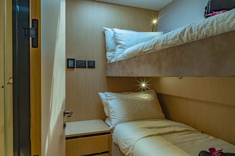 Jack Yacht Photos Pics 2023 McConaghy MC75 yacht cabin with modern bunk beds and ambient lighting.