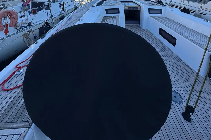 Le Joy Yacht Photos Pics 2018 Grand Soleil 48 yacht deck with covered wheel and sleek design.