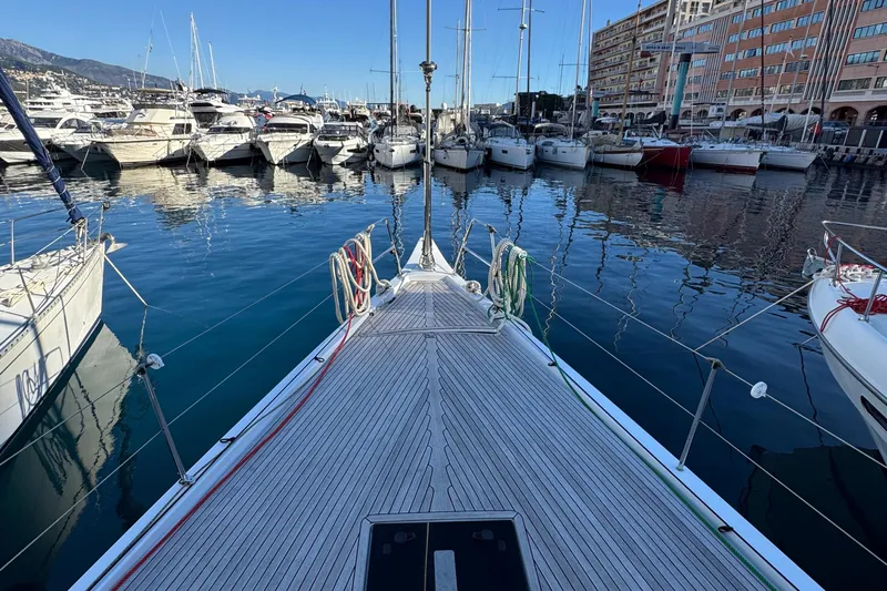 Le Joy Yacht Photos Pics Sailing yacht Grand Soleil 48, 2018 model, docked in a marina with other boats.