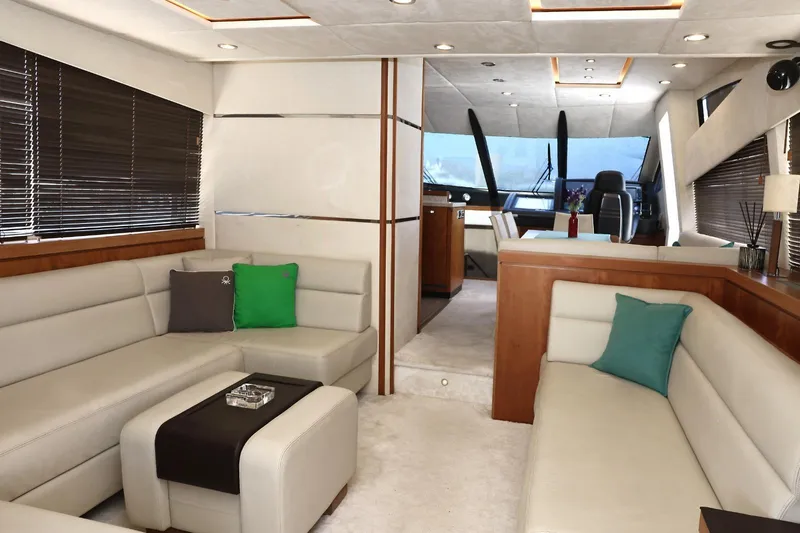  Yacht Photos Pics Luxurious interior of 2012 Sunseeker Manhattan 63 yacht with elegant seating and modern design.