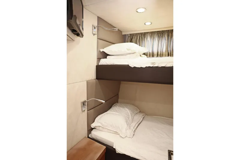  Yacht Photos Pics Bunk beds in 2012 Sunseeker Manhattan 63 yacht cabin with modern lighting.