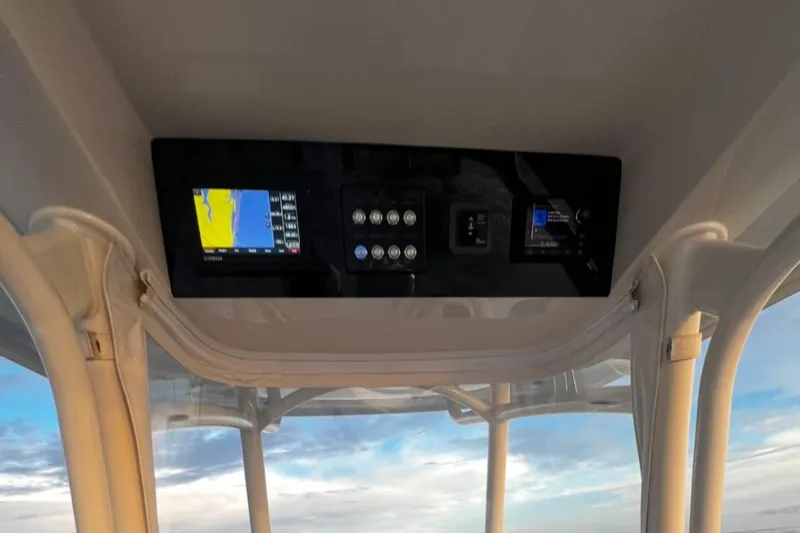  Yacht Photos Pics Control panel of 2019 Jupiter 30 HFS boat with navigation display.