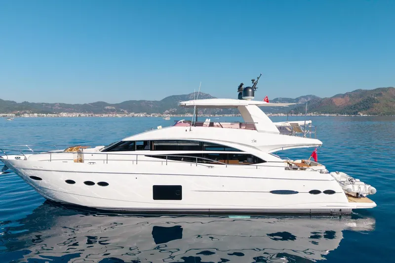 My Lady Yacht Photos Pics 2014 Princess 72 Flybridge Motor Yacht on calm waters, scenic mountain backdrop.