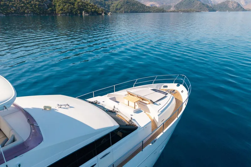 My Lady Yacht Photos Pics Luxurious 2014 Princess 72 Flybridge Motor Yacht cruising on serene blue waters.