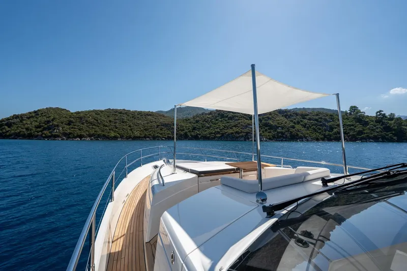 My Lady Yacht Photos Pics 2014 Princess 72 Flybridge Motor Yacht cruising in scenic blue waters.