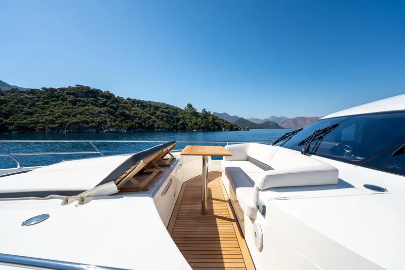 My Lady Yacht Photos Pics Luxurious 2014 Princess 72 Flybridge Motor Yacht with scenic ocean view and elegant deck seating.