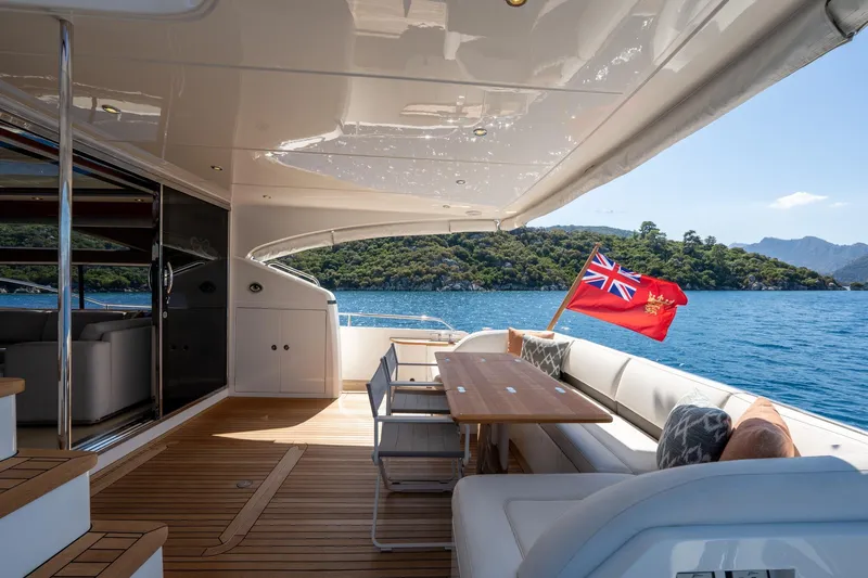 My Lady Yacht Photos Pics Luxurious 2014 Princess 72 Flybridge Motor Yacht with elegant deck and scenic ocean view.