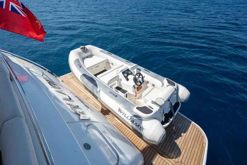 My Lady Yacht Photos Pics 2014 Princess 72 Flybridge Motor Yacht with tender on deck, ocean backdrop.