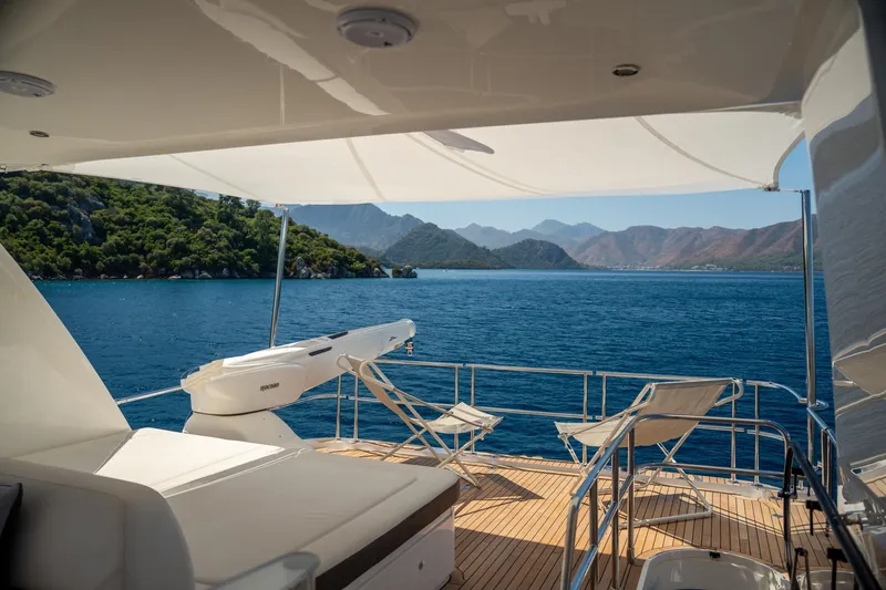 My Lady Yacht Photos Pics Luxurious 2014 Princess 72 Flybridge Motor Yacht with scenic ocean view and comfortable seating.